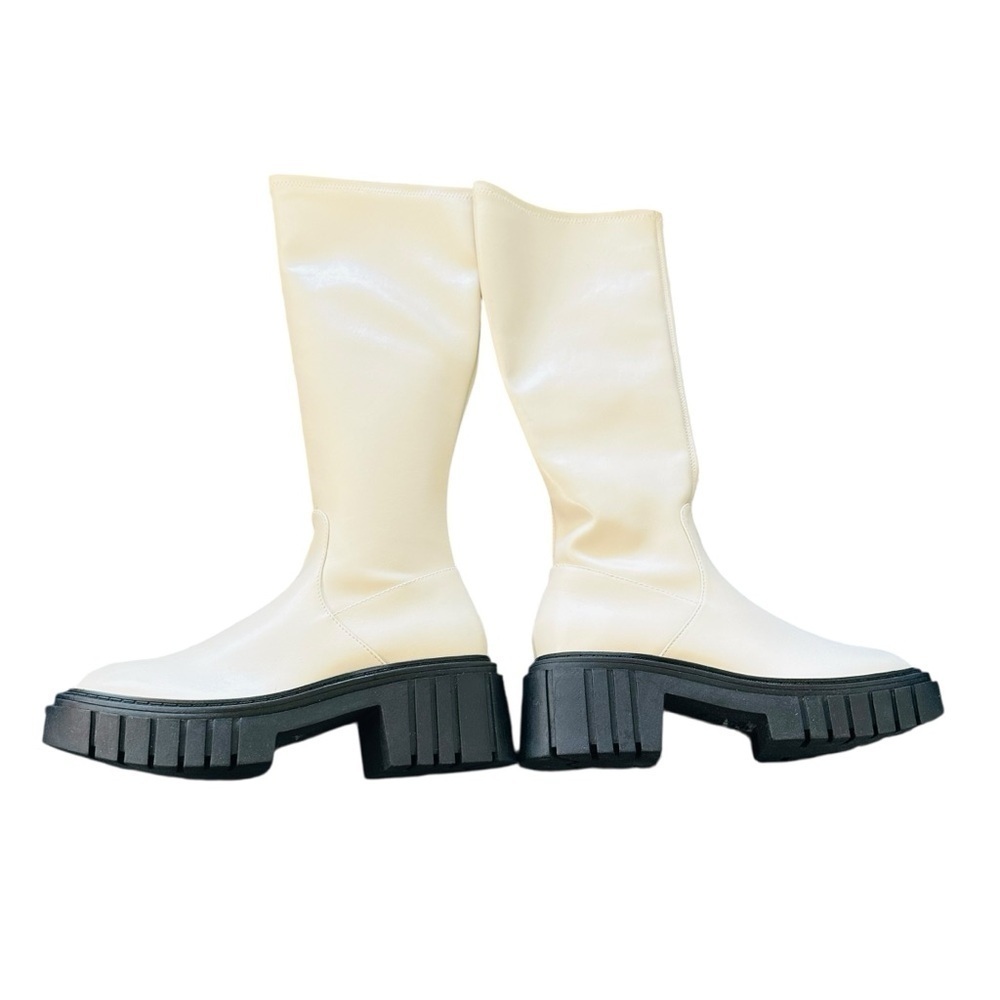 Chic Cream Heeled Boots with Black Sole